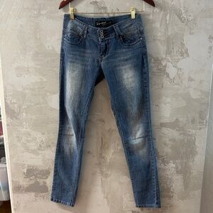 Forever 21 Women's Faded Blue Mid-Rise Skinny Jeans